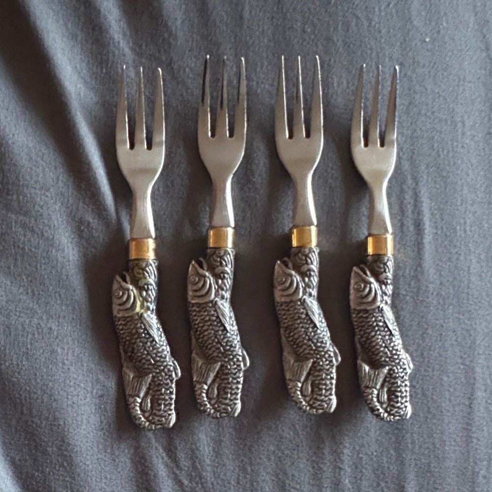 Set of 4 Arthur Court Aluminum Salon handle fish forks. Great condition.